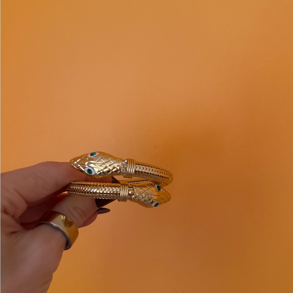 Chic Gold Snake Bangle with Green Eyes